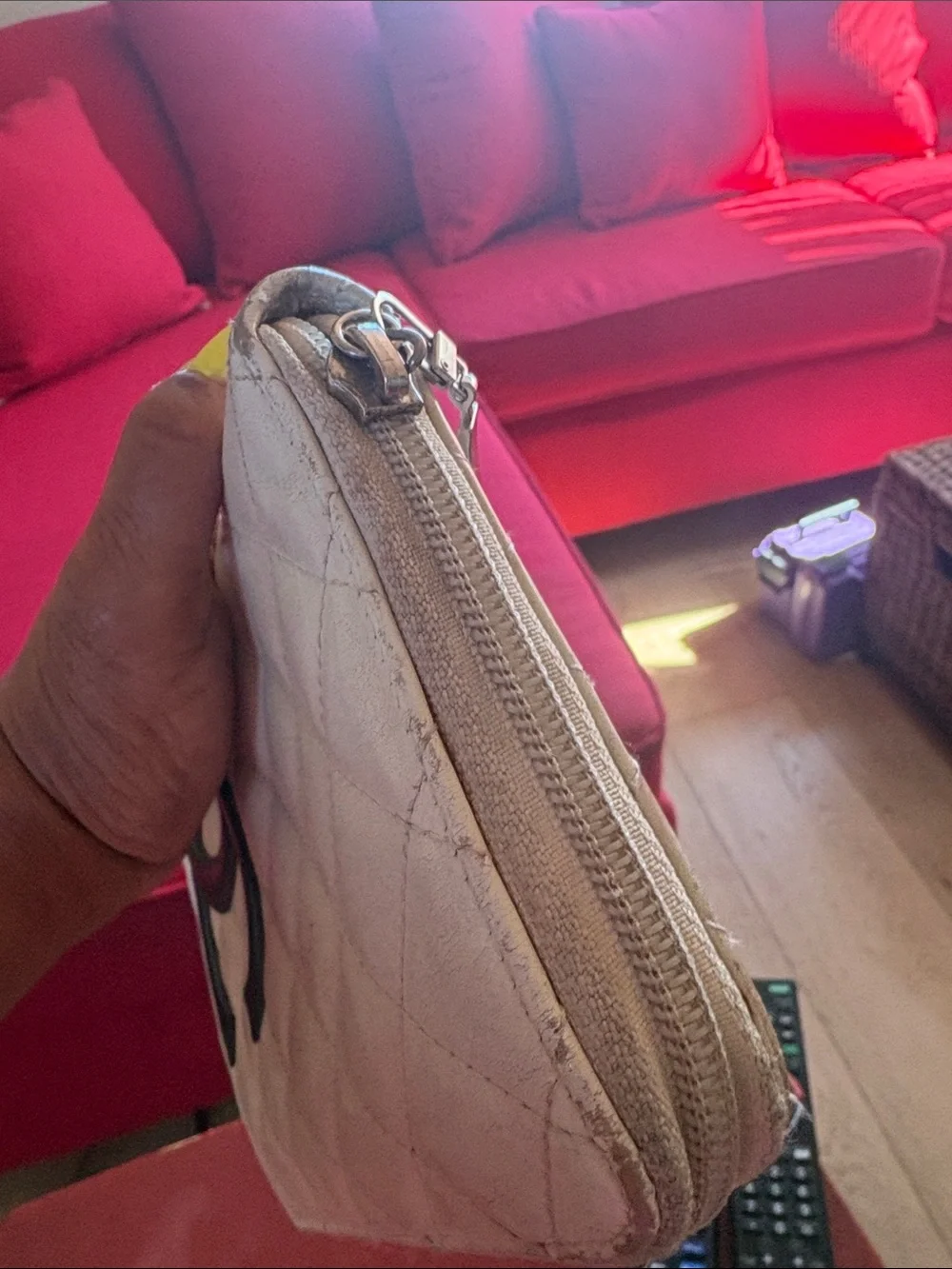 CHANEL Quilted Zip Wallet in Cream with Black CC